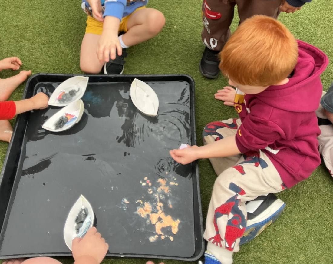 Children exploring a tuff tray investigation during an INNOVATEclub incursion